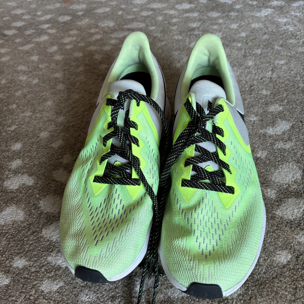 Green Nike running shoes